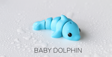 Load image into Gallery viewer, Pocket Pals - Articulated Fidget Toy - Baby Dolphin
