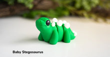 Load image into Gallery viewer, Pocket Pals - Articulated Fidget Toy - Baby Stegosaurus
